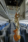 Airbus A310, Economy Class mit heruntergelassener Sauerstoffmaske© MDM / Ina Rossow